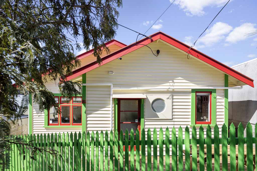 painters painting ceiling and walls inside wellington home